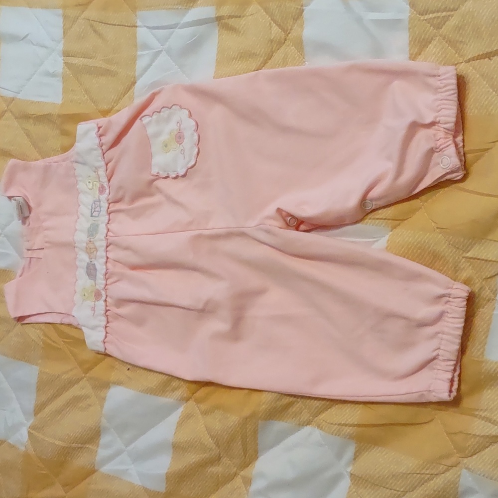 Infant smocked romper.